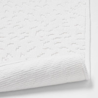 20"x32" Snow Leopard Bath Mat White - Threshold™