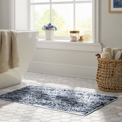  20"x32" Spacedye Striped Bath Rug - Threshold™