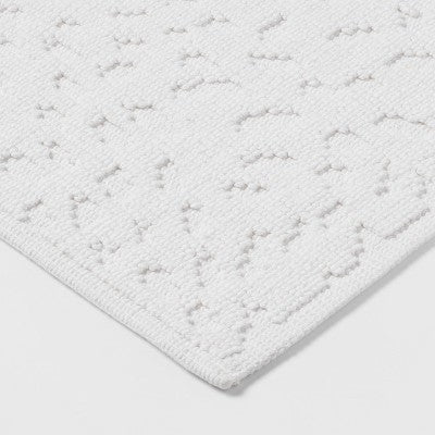  20"x32" Snow Leopard Bath Mat White - Threshold™